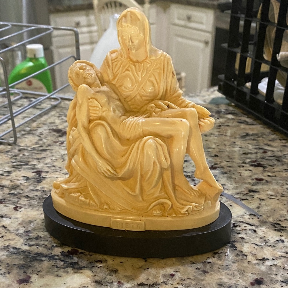Elegant Cream Pieta Sculpture
